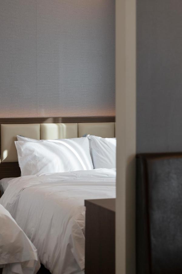 Busan Lounge 26 Hotel Bagian luar foto